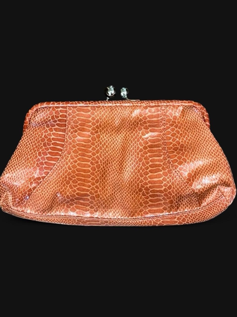 retro-style orange faux snakeskin clutch!
